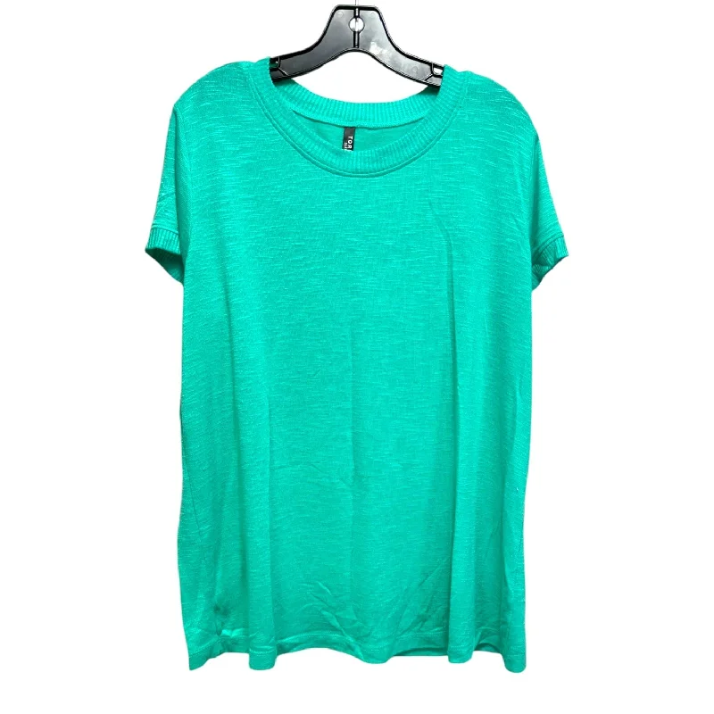 women's tops for those who want to wear versatile pieces that can be dressed up or downTop Short Sleeve By Torrid In Green, Size: L